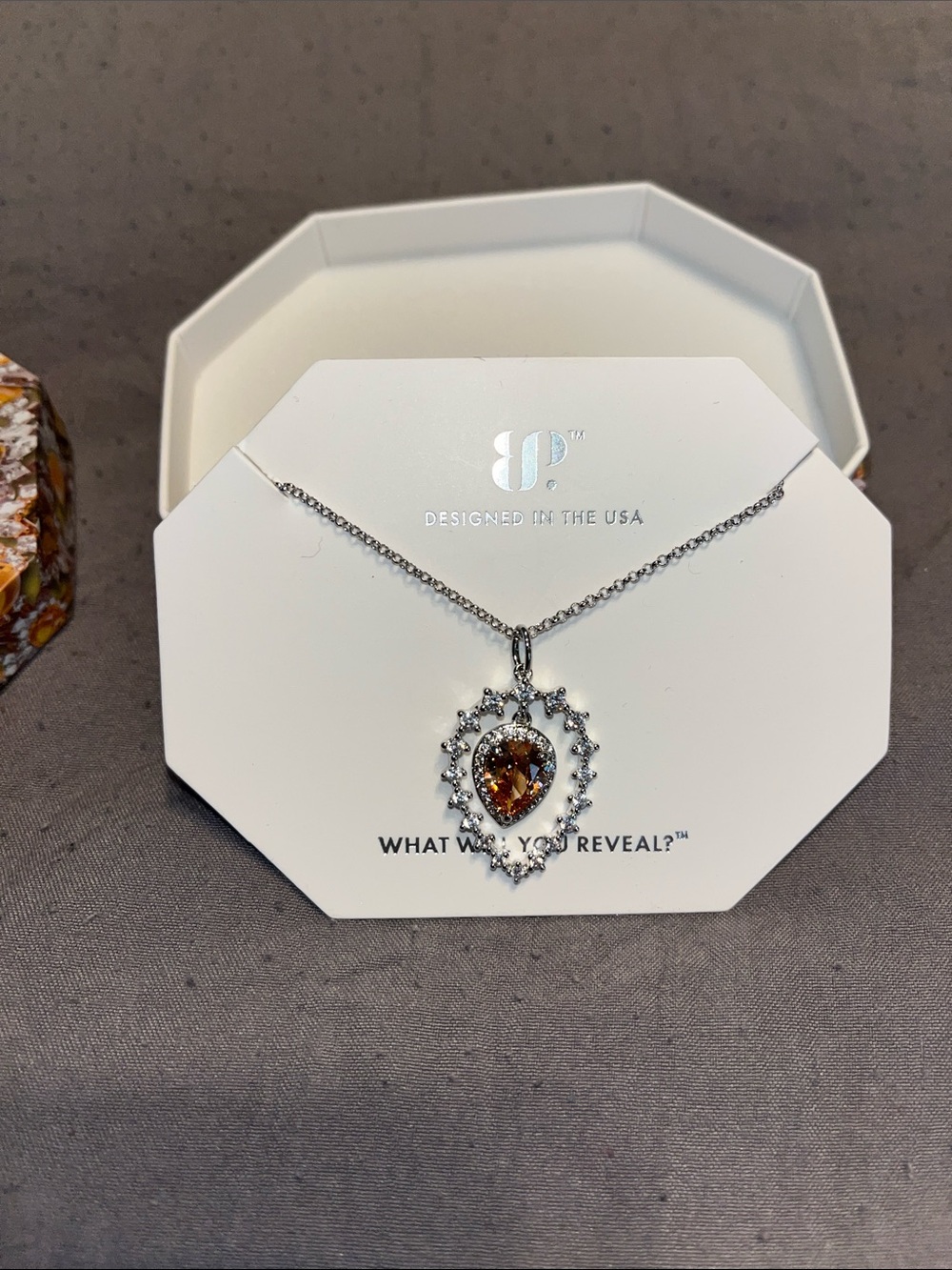 BP Rhodium Necklace with Amber Topaz Teardrop Pendant and Halo Accents